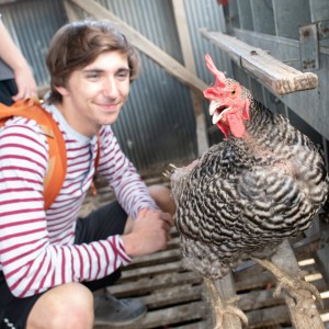 Student next to a turkey