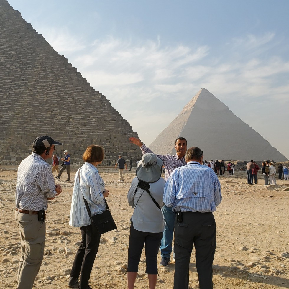 Image of Travel Program attendees looking at pyramids